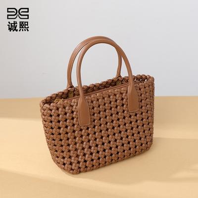 Nieuwe niche draagbare groentemand dameshandtas gepersonaliseerde windmolenknoop handgeweven tas retro casual veelzijdige moeder-en-kindtas