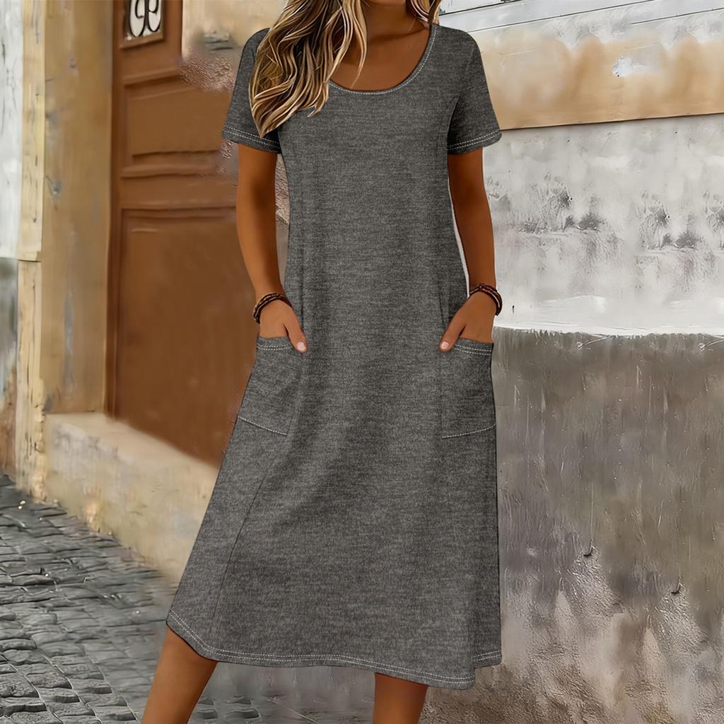 Women Casual Loose Fit Crew Neck Short Sleeve Midi Dress with Pockets Soft Fabric Comfortable Everyday Wear Suitable for Various Occasions