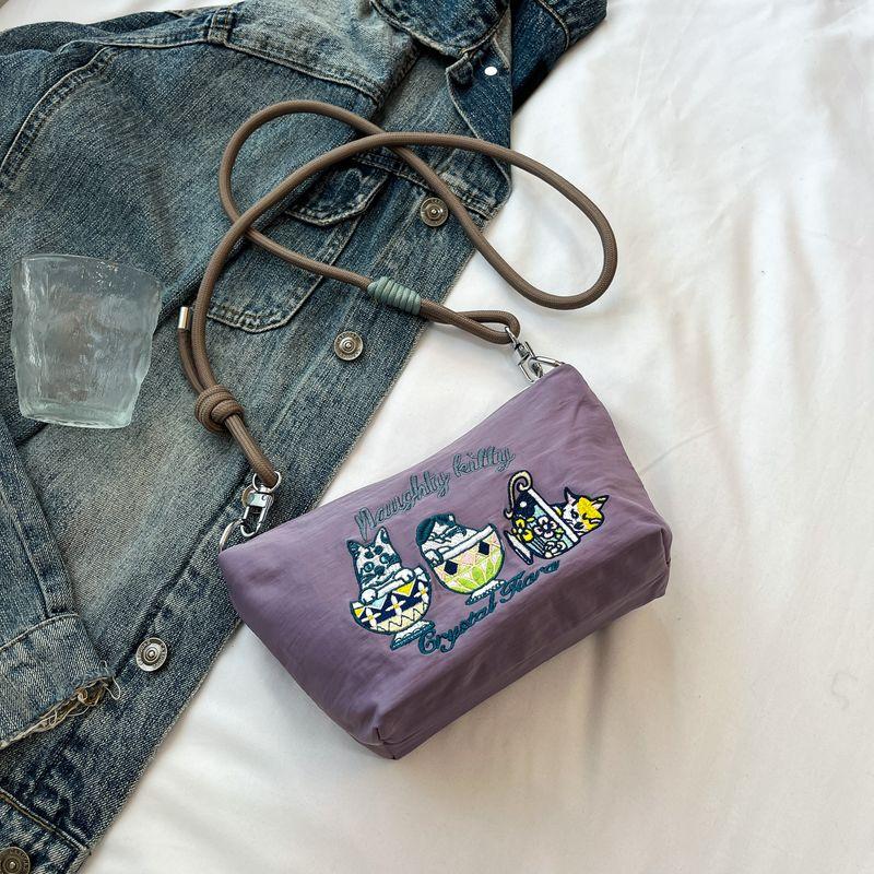 

Summer Summer Cute Embroider Oxford Cloth Work Clothing Small Bag Female 2025 New Arrival Casual Crossbody Zipper Phone Bag Purple
