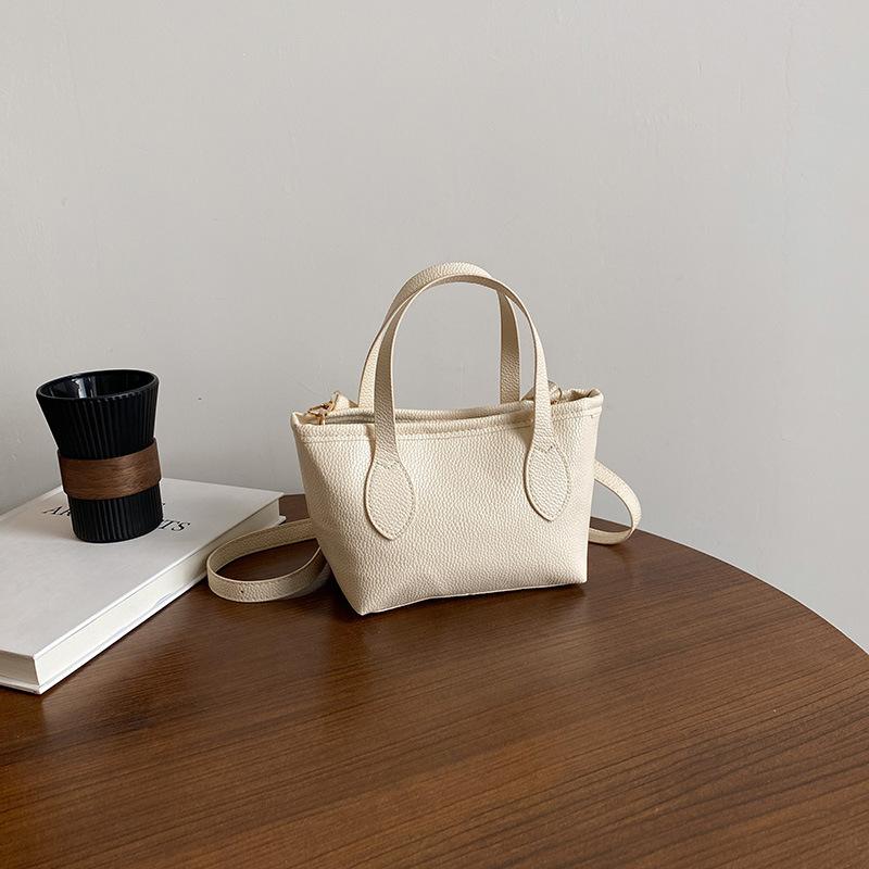 

High value, beautiful, simple, niche, casual and light, versatile, portable bucket, tote bag, shoulder messenger bag, women