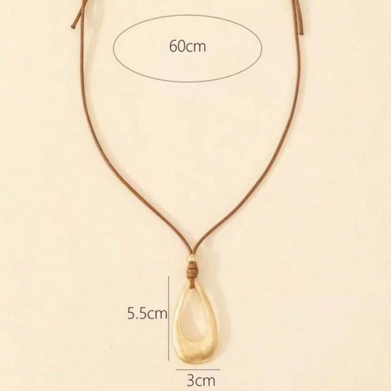 Female Necklace Retrostyle With Hollow Droplet Shape And Titanium Steel Detail