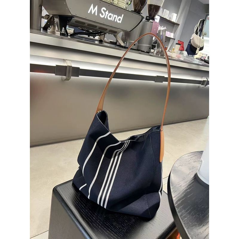

Loose Feeling Large Capacity Large Bags New Arrival Textured Canvas Retro Striped All-Matching Commuter Shoulder Bag Bucket Bag for Women Default
