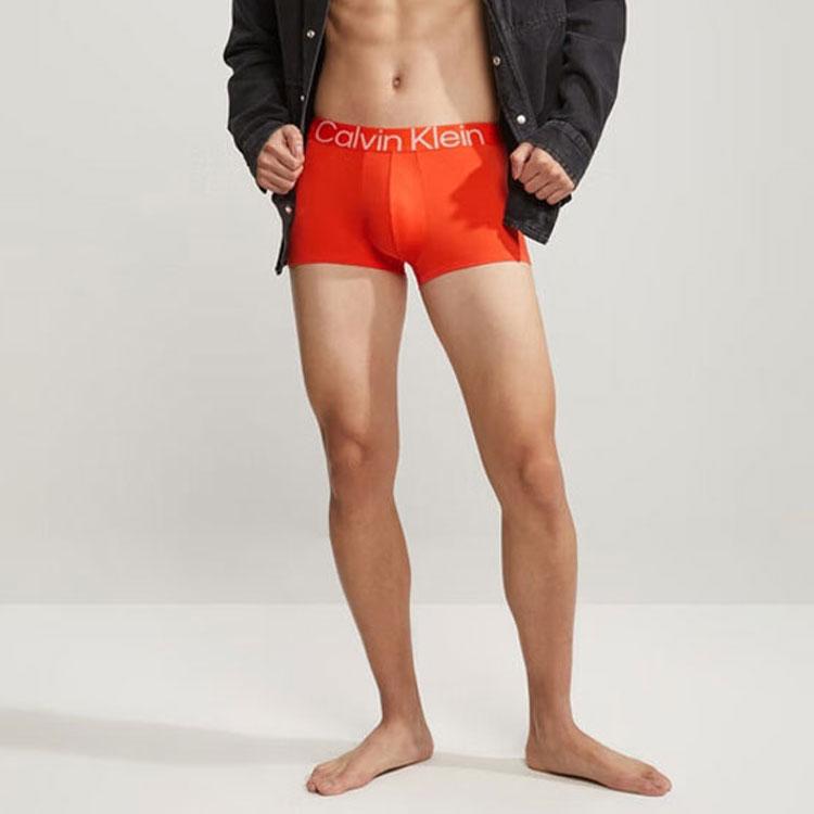 Calvin Klein Logo Bestickte Hüft-Boxershorts Herrenunterwäsche Lebhaftes Orange NB3455-3CI