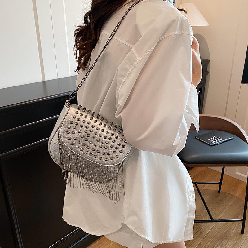 bags women's bag 2025 new korean version fashion tassel shoulder bag personality rivet trend versatile crossbody saddle bag