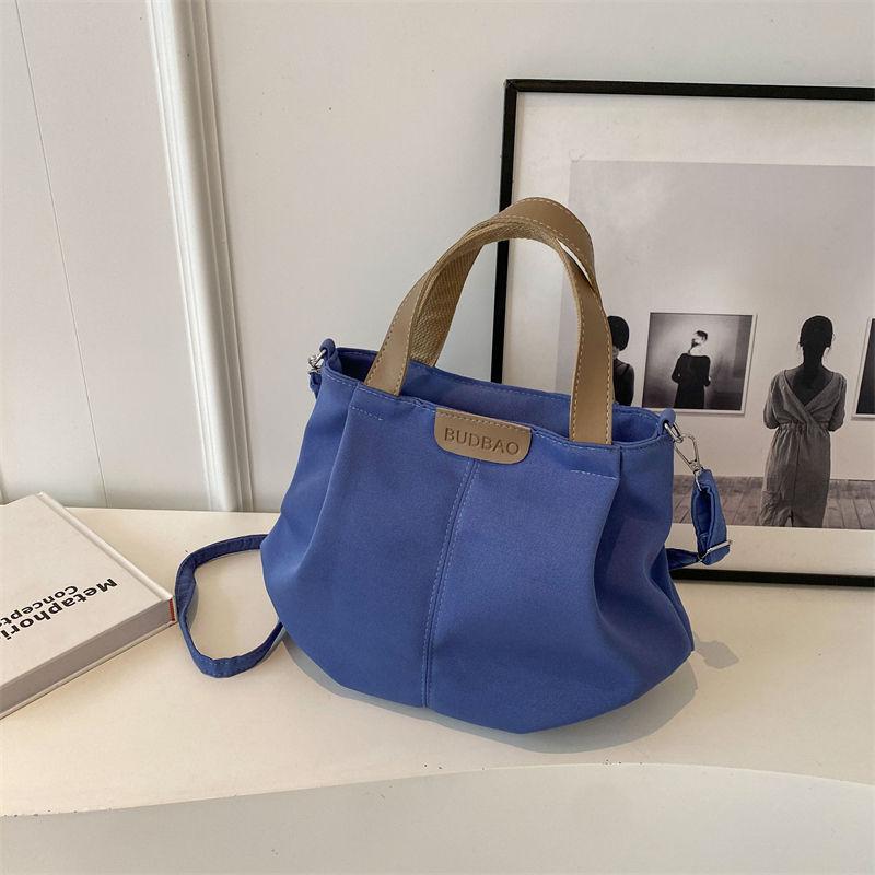 Casual canvas bag women's new versatile simple shoulder handbag fashionable large-capacity student class shoulder bag