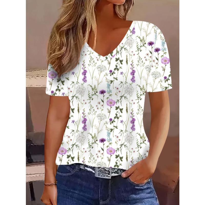 

A Short-Sleeve V-Neck T-Shirt for Women Featuring a Fully Printed Design with a Vibrant Watercolor Floral Pattern. Made from Breathable S