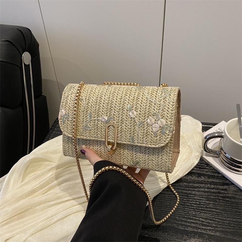 Foreign style straw woven bag women's 2025 new small fresh flower woven saddle bag fashionable shoulder messenger bag versatile