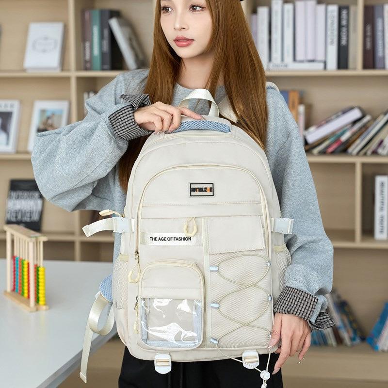 New backpack, junior high school student burden reduction spine protection schoolbag, female high school large-capacity male backpack, high-end niche