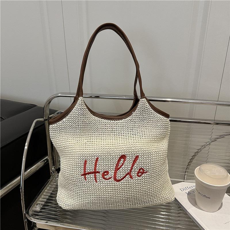 Alphabet woven straw personalized large capacity hollow holiday wind beach shoulder tote bag