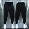 Pantalones informales para hombre, cintura elástica, botones, bragueta, pantalones largos, bolsillos, cierre de Color sólido, puños de cinta, pantalones de estilo deportivo de tenis