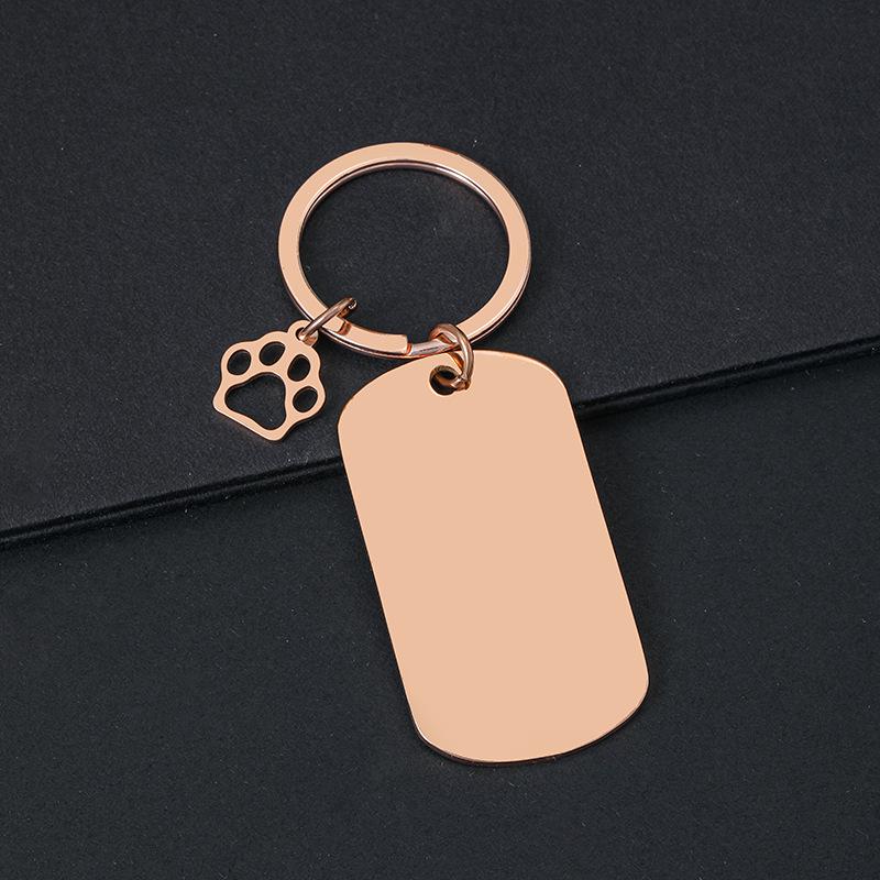 Breloczek do kluczy z łapą psa drukowaną laserowo - Międzynarodowy metalowy prezent