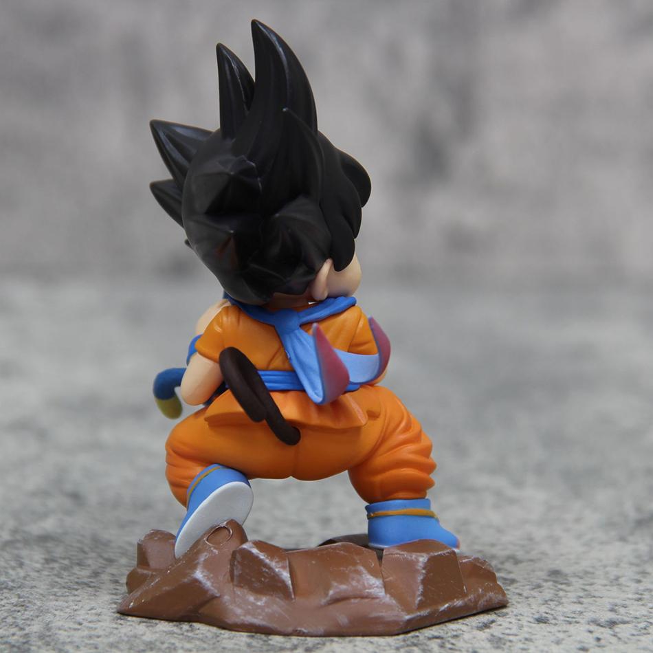 9cm Dragon Ball Kawaii Figur Kindheit Son Goku Hält Puaru Actionfiguren Anime Modell Puppe Sammlung Schreibtisch Dekoration Spielzeug
