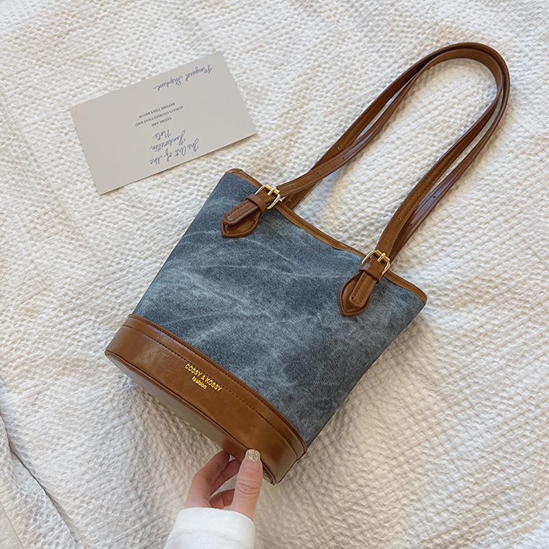 

Autumn retro bucket bag women s 2024 new trendy personalized shoulder bag niche large-capacity commuter handbag