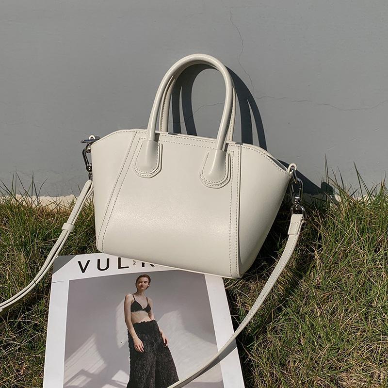 Niche Handbag Wing Bag Temperament Cowhide Large Capacity Commuting Shoulder Dumpling Bag Messenger Bag Women