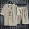 Ice Silk Waffle Sports Set: Loose Half-Sleeve T-Shirt & Half-Pants for Summer Leisure