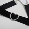 European-American Cross-Collar Velvet Choker: Hollow Rhinestone Peach Heart Design.