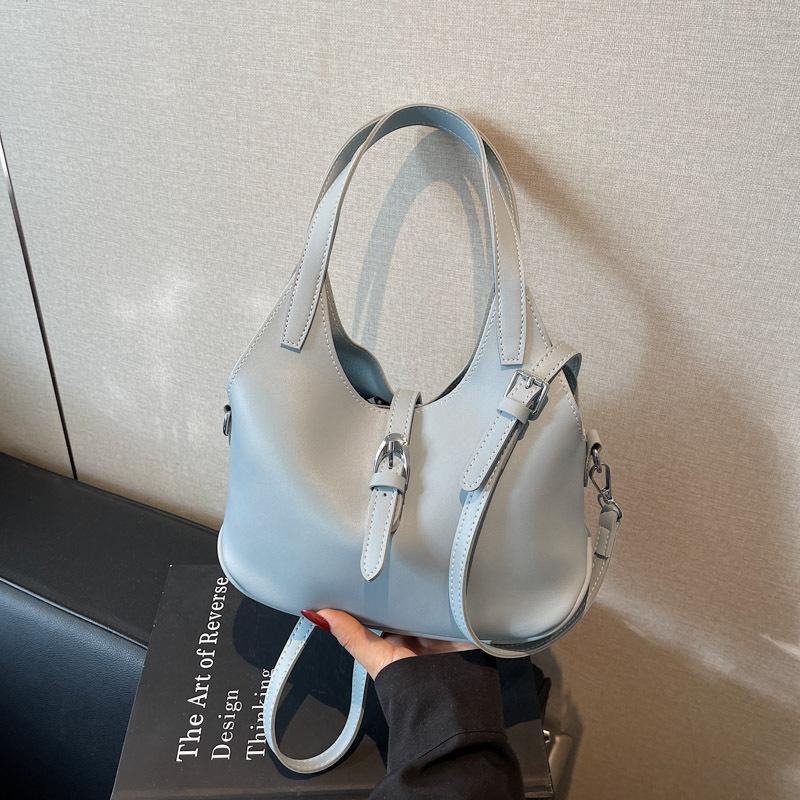 

Korean version bag commuter handbag women s 2025 new simple bucket bag solid color simple messenger vegetable basket bag светло-синий