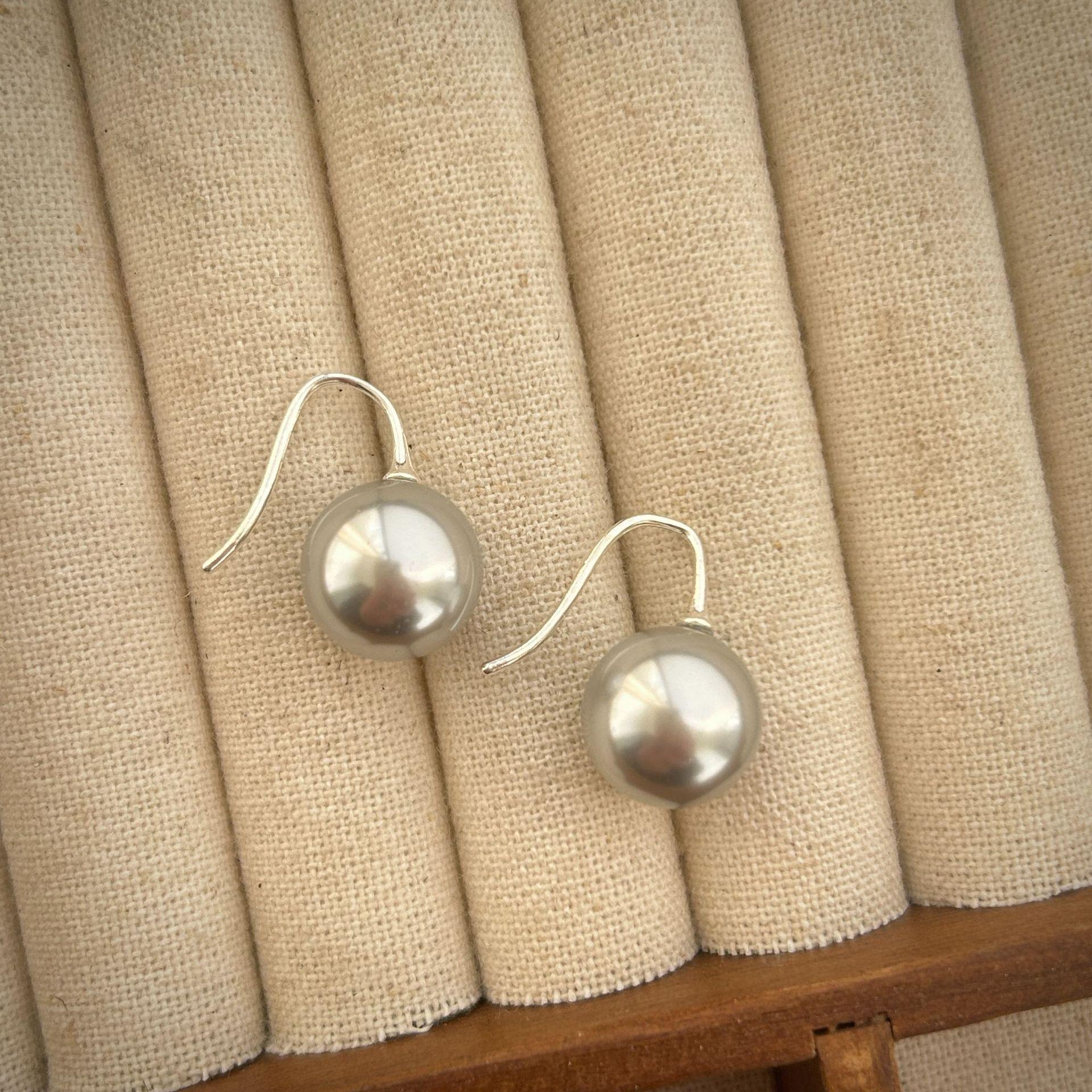 

Серьги из стерлингового серебра 925 пробы с жемчугом: 2024 Дизайн нишевого хай-энда, популярный у интернет-знаменитостей 8MM Pearl