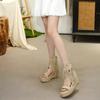 Retro straw brown rivet fringed cool boots women's 2025 summer new slope heel open-toed rear zipper Roman short boots
