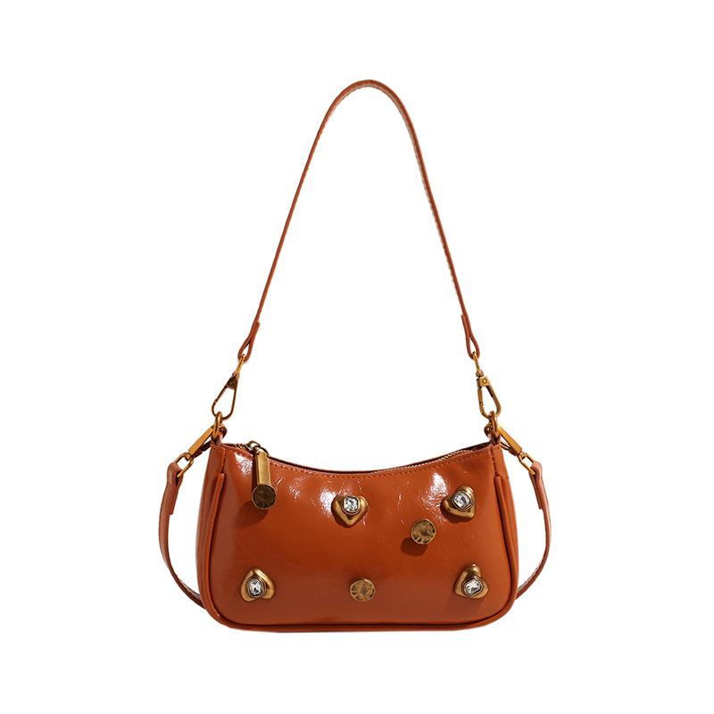 Woman Bags bag 2025 new Korean version of fashion rivets personalized trend women's shoulder crossbody armpit bag