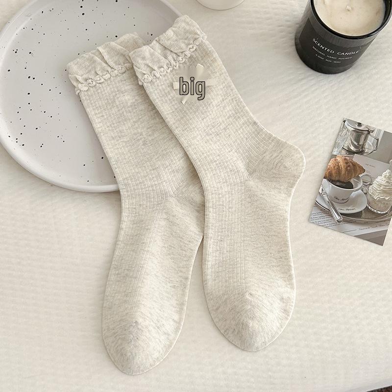 

Женские теплые носки в вертикальную полоску с кружевным бантом - корейский и японский стиль One Size бежевый