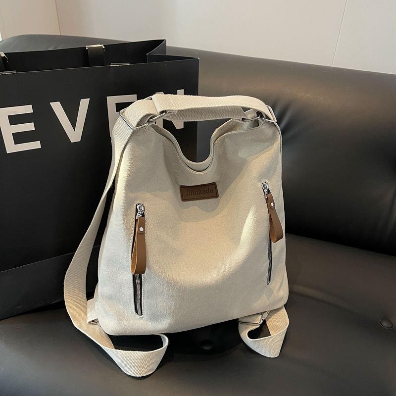 Double zipper shoulder bag New canvas Large capacity simple casual oblique span bag Multifunctional commuter backpack
