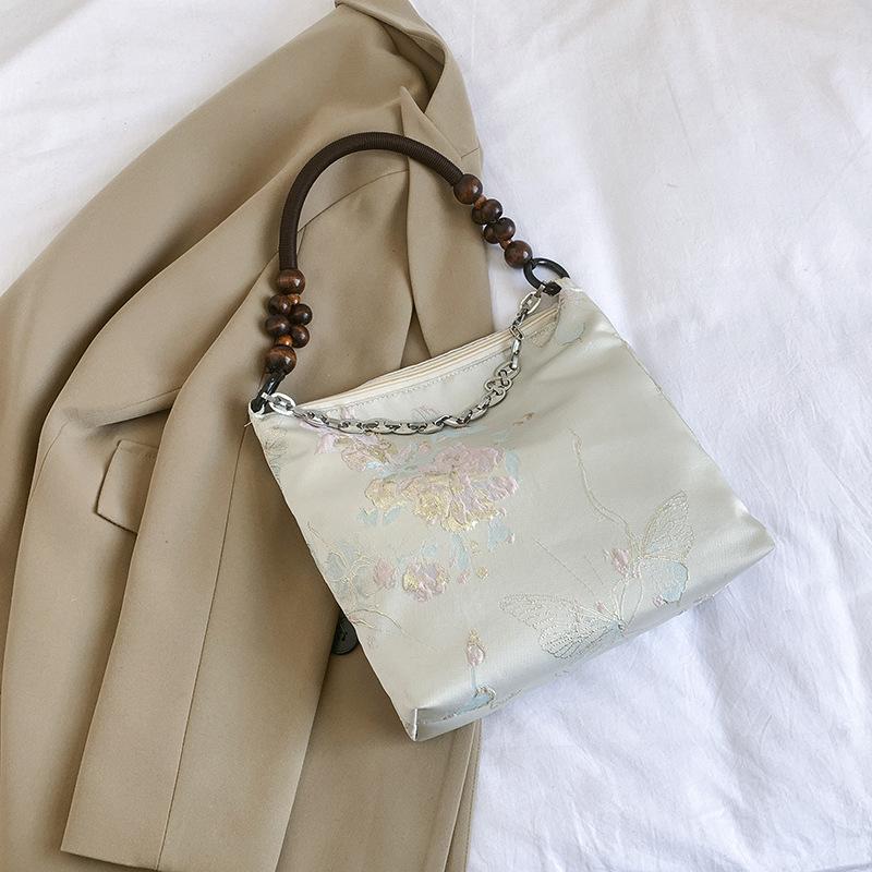 

Новая повседневная сумка на одно плечо с подмышкой большой вместимости, женская простая модная новая летняя сумка-тоут в китайском стиле 2024 года серебряный