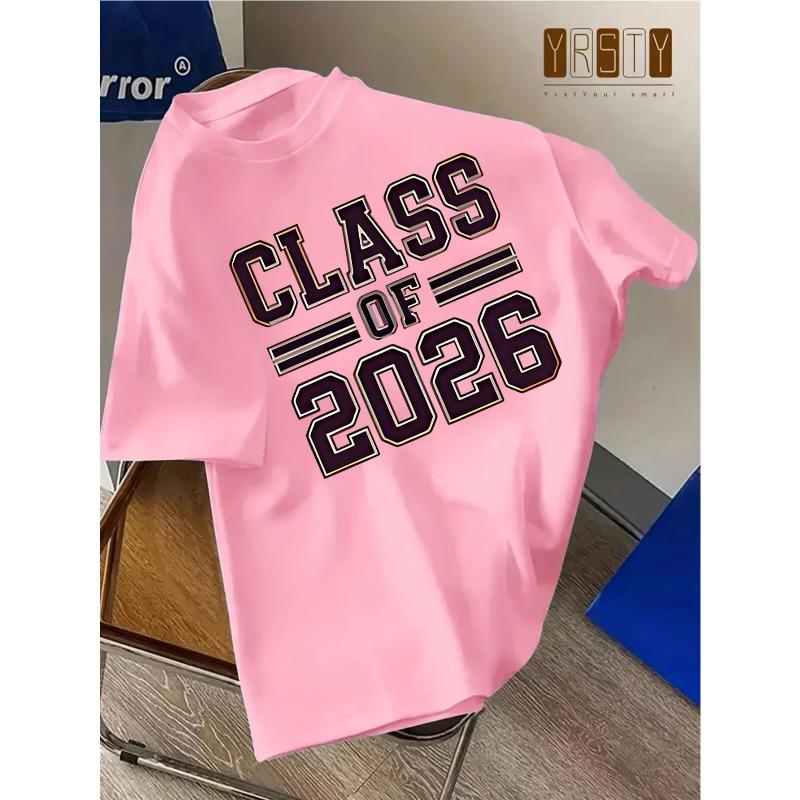 European sizes A Loose Short-Sleeve T-Shirt with The Text 'CLASS OF 2026' Displayed Against a Wooden Background, Perfect for Graduation Season