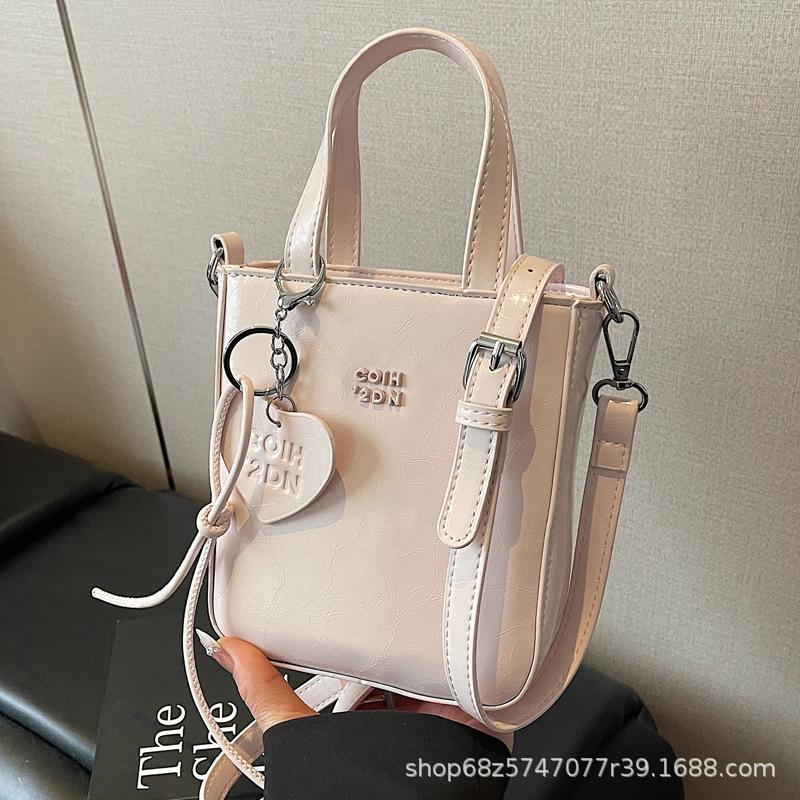 Niche light luxury hand-held small square bag women's 2025 new trendy love simple mobile phone bag high-end crossbody bag