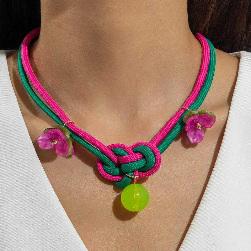 A Unique Knotted Design Necklace With Leaves Starfish And Scallops A Simple Drawstring Pendant Necklace With A Bow And Pearls