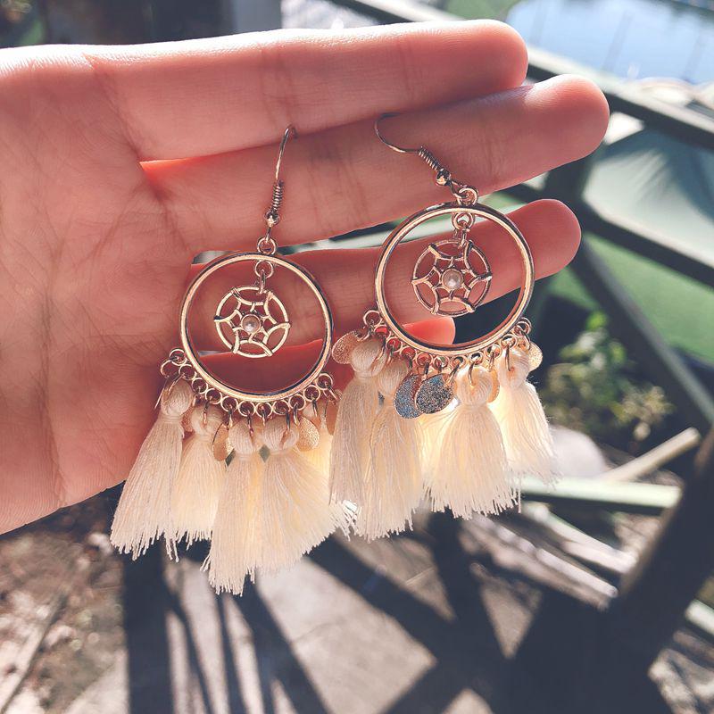 Yunnan Ethnic Bohemian Feather Earrings - Exaggerated No-Pierce Clips for Women
