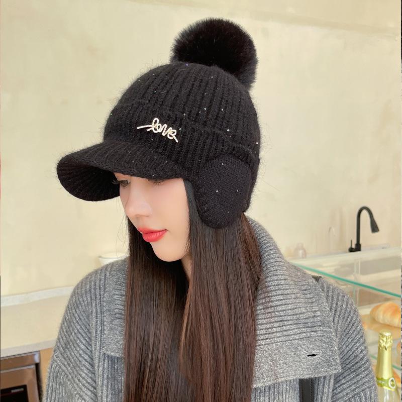Hut Damen Herbst und Winter gestrickte Wollmütze Vielseitige verdickte kältefeste Ohrenschutzmütze Winterwarme Plüschmütze