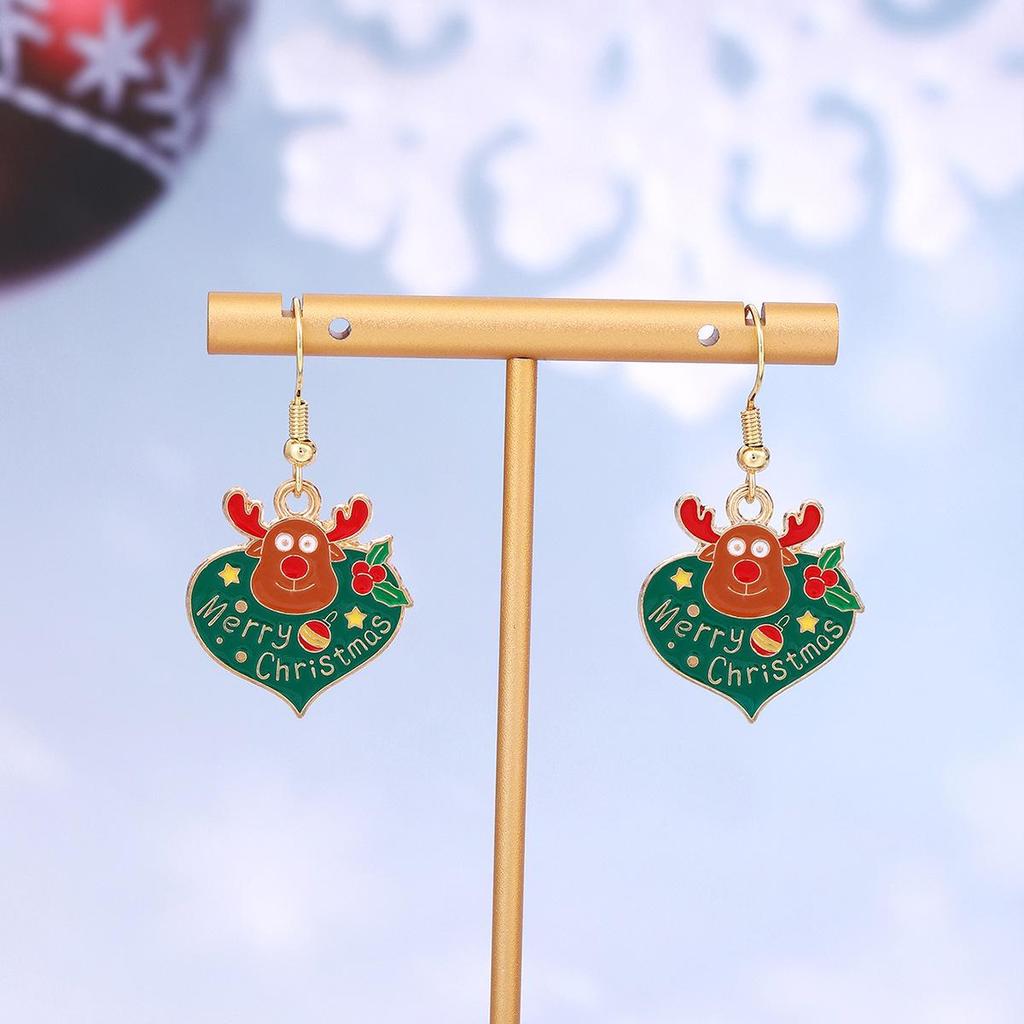 Festive Reindeer & Gingerbread Earrings: Christmas Cartoon Drip Oil Design