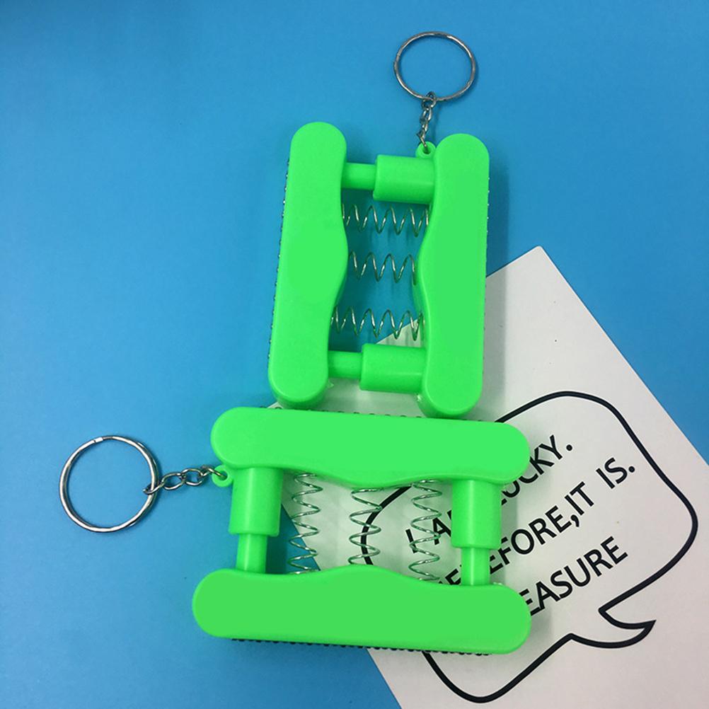 Zufällige Farbe Lustiger Elektroschock Handgriff Schlüsselanhänger Mini Sicherheit Aprilscherz Streich Trick Spielzeug
