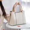 A stylish 2024 new model Chinese-style embroidered large-capacity handbag and crossbody bag for mom, a high-end bag for middle-aged women