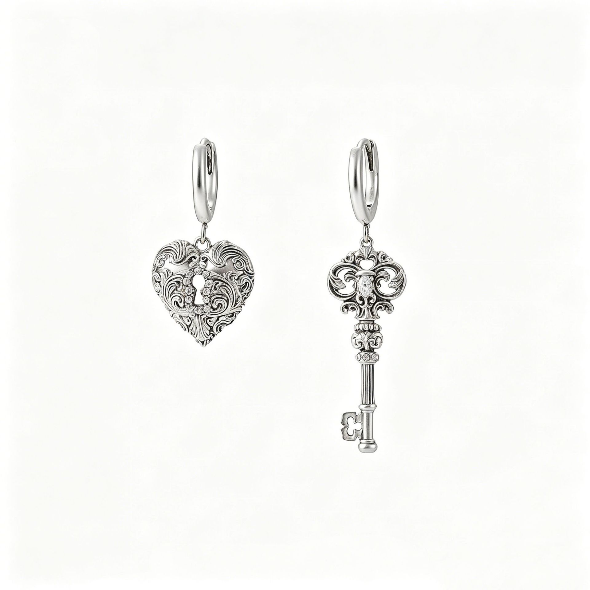 

Gold retro heavy industry love lock cylinder asymmetrical key earrings niche design love female stud earrings personality temperament