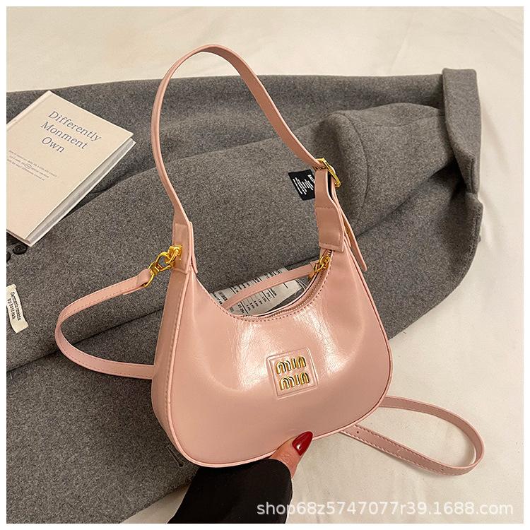 

2025 New Korean cream-style handbag temperament commuter armpit bag fashionable foreign crescent bag retro shoulder bag розовый