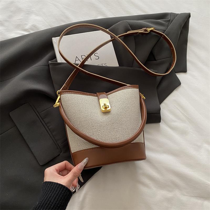 

Bag women s new trendy fashion portable bucket bag niche design contrasting color splicing shoulder messenger bag