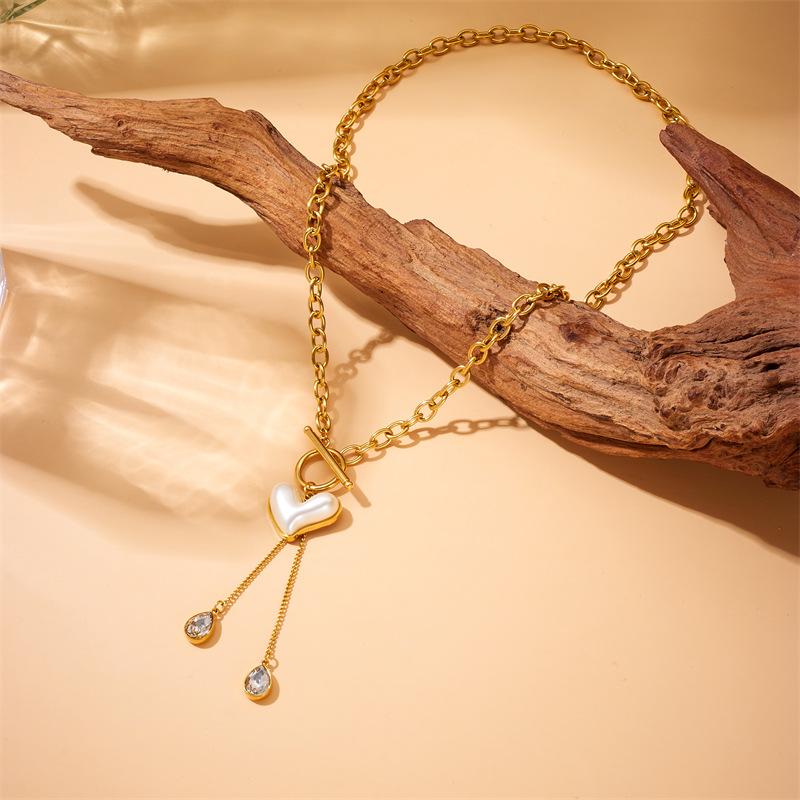 

Gold Plated Stainless Steel Toggle Chain Necklace with Pearl Heart Pendant Teardrop CZ Tassels for Women золотий