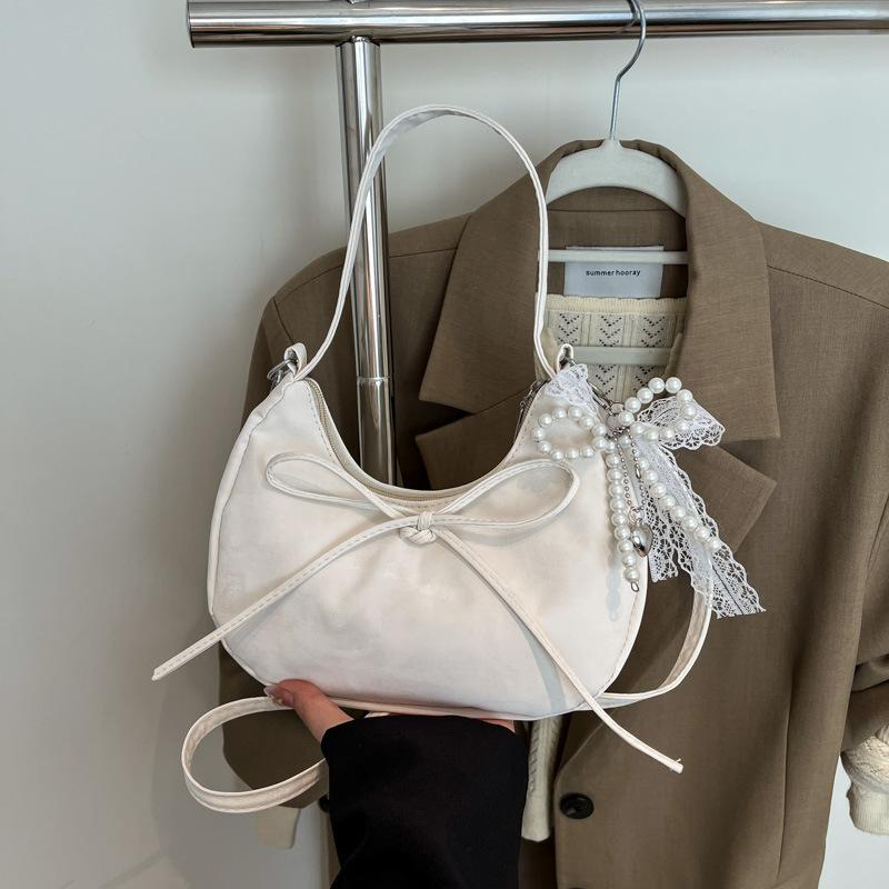 Niche Bow Hand Carry Crescent Moon Bag Women's 2025 New Fashion Simple Shoulder Armpit Bag Shoulder Messenger Bag