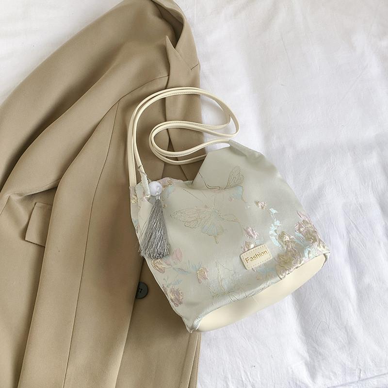 Trendy And Fashionable Bucket Bag With Spacious Interior For Everyday Use OffWhite