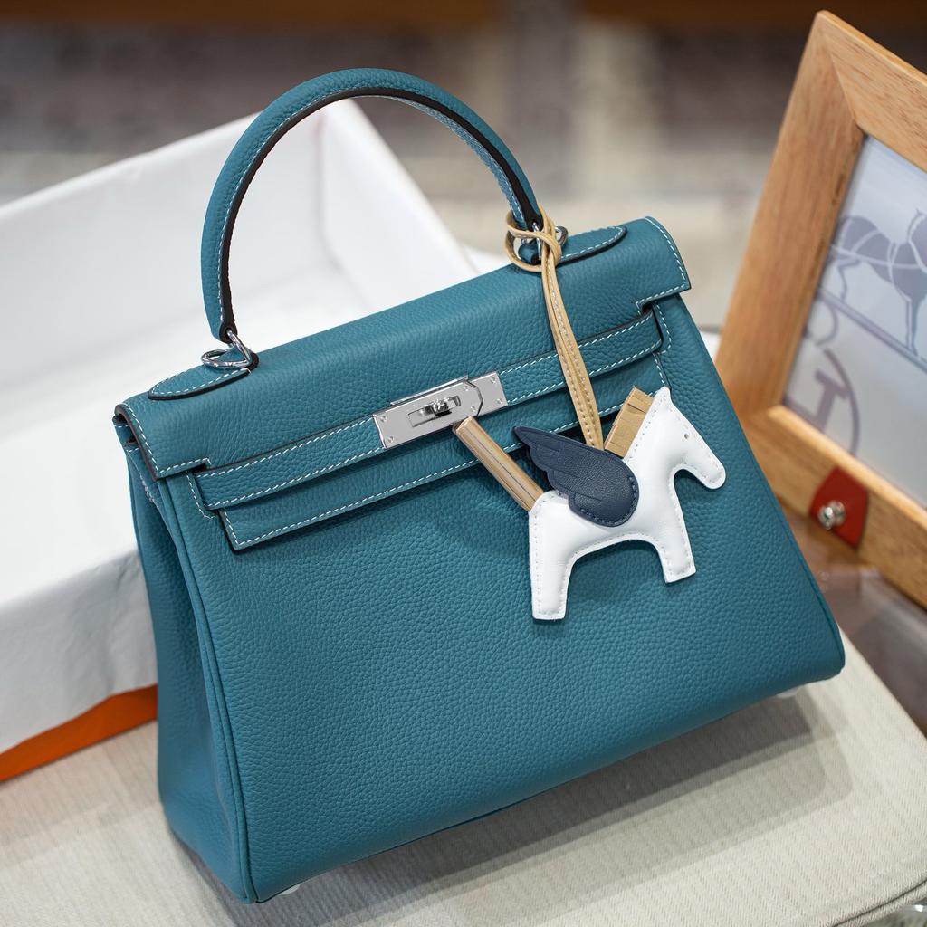 25 Neue Kelli Tasche Togo Rindsleder erste Schicht breiter Schultergurt silberne Schnalle große Kapazität tragbar Schulter Umhänge Tasche Pendler Damen Tasche