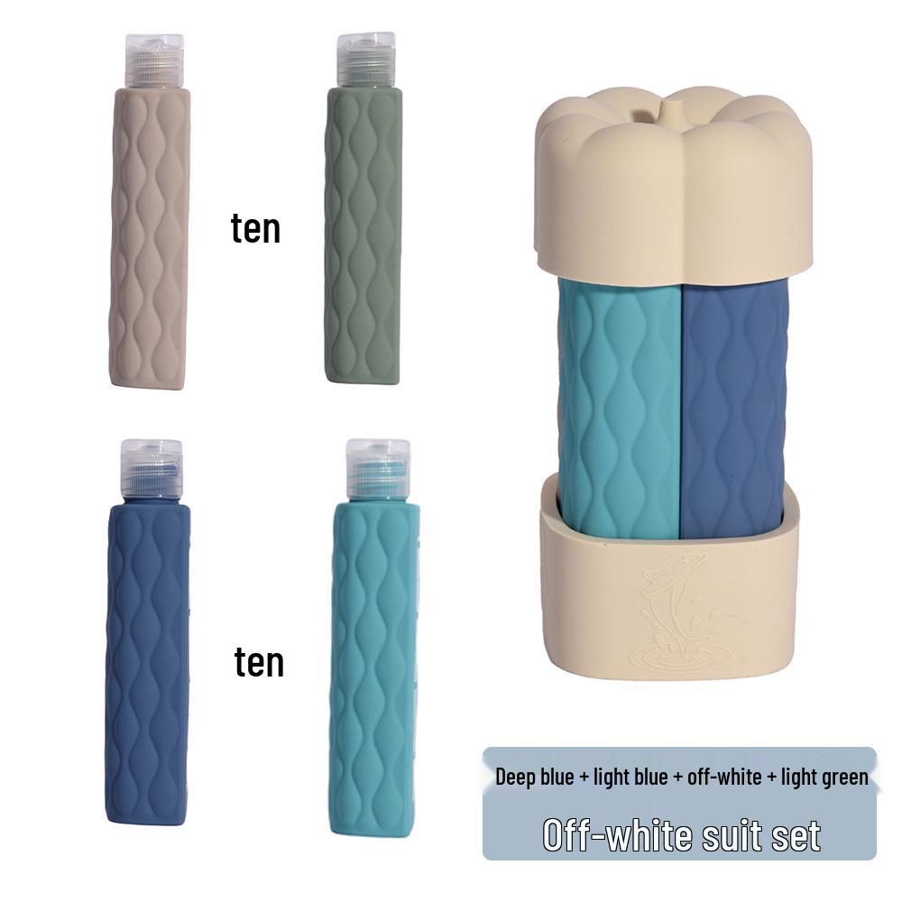 

Silicone 4-in-1 Refillable Travel Bottle Set for Shampoo and Shower Gel Silicone Travel Four-in-One Refillable Bottle Set
