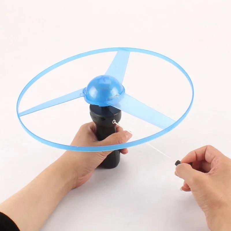 1pc Pull Wire Glow Ufo Funny Spinning Flyer Luminous Led Light Handle Top Toys For Kids Gifts Outdoor Sport Parent-child Game