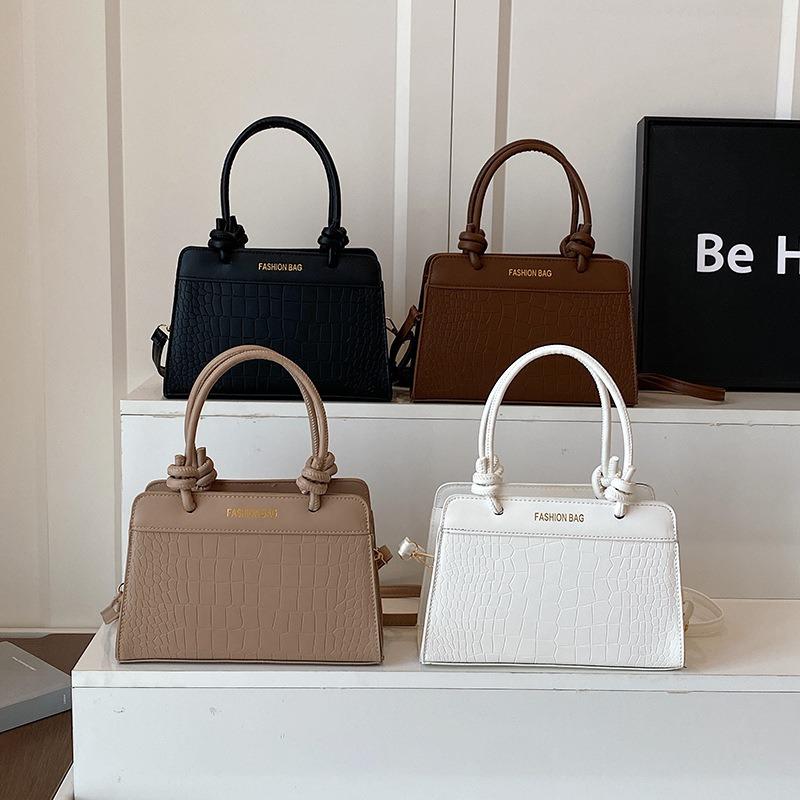 Casual handbag women's new fashionable texture messenger bag splicing niche design saddle bag