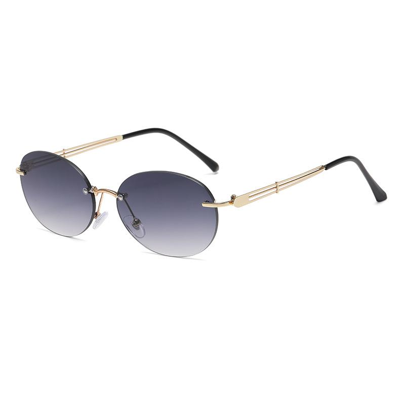 

Retro Rimless Oval Sunglasses Literary Atmosphere Metal Temple Decor Fashionable Versatile Sunscreen Sunglasses 3918 сірий