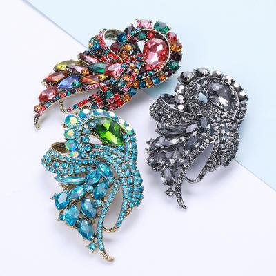 Broche de luxe rétro en alliage atmosphérique pour femme, accessoire haut de gamme pour costume et robe, cadeau