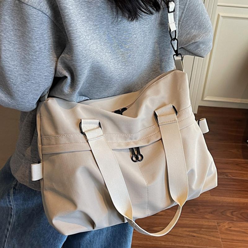 Leisure sports large-capacity handbag 2025 new Korean version fashion foreign style shoulder bag simple travel messenger bag