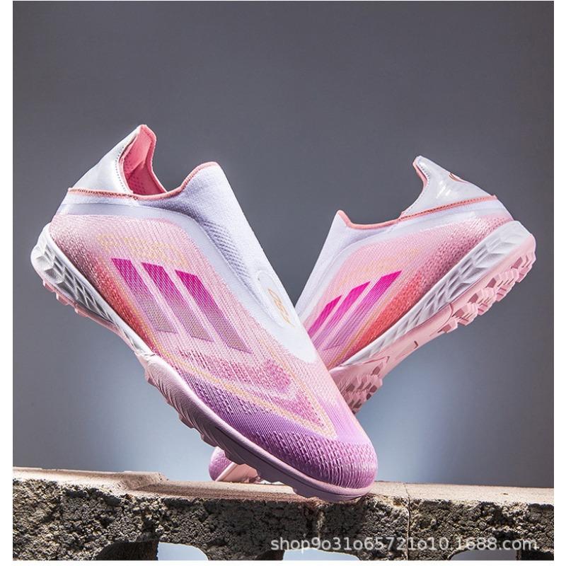 Nové kopačky na mistrovství světa Kolíky Přírodní tráva Zlomené kolíky Pánské a dámské tréninkové boty Profesionální soutěž