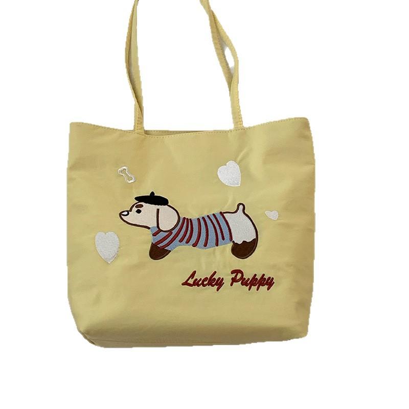 Canvas Bag Design Sense Niche Underarm Bag Women 2025 New Simple Cartoon Puppy Tote Bag Shoulder Bag Portable